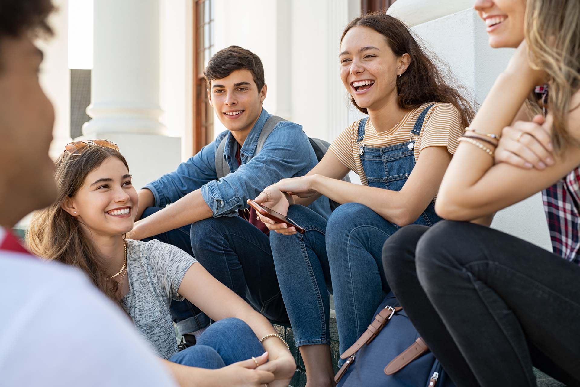 Students build relationships with their peers having cheerful conversation
